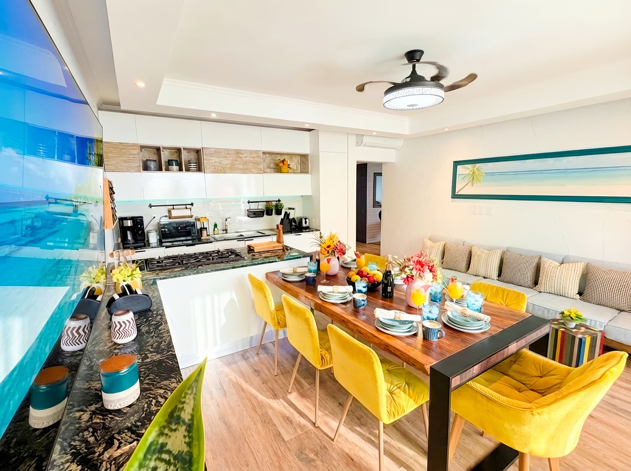 Designer living room with sunset ocean art